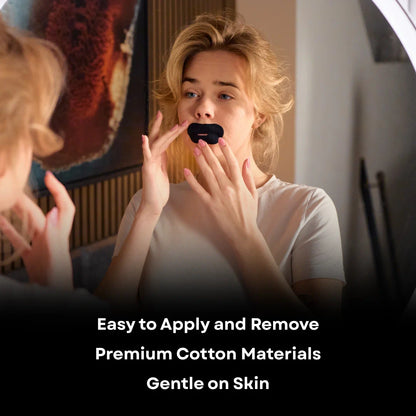 Woman applying VEYO premium mouth tape in front of mirror for gentle skin-friendly sleep support