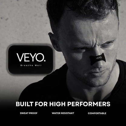 Male athlete using VEYO nasal strip 
