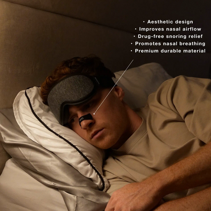 Man sleeping comfortably wearing a VEYO nasal strip